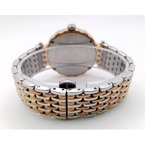 562 - A Matio Valentino Stylish Quartz Ladies Watch. Two tone bracelet and case - 37mm. Mother of pearl di... 