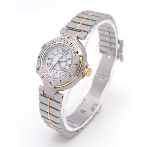 656 - A Dunhill Quartz Ladies Watch. Two tone stainless steel bracelet and case - 29mm. White dial with da... 