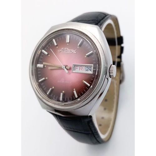 703 - A Vintage Alpiex 25 Jewels Automatic Gents Watch. Blacl leather strap. Stainless steel case - 38mm. ... 