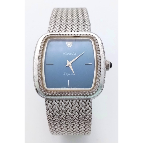 829 - A Vintage Nivada Elegance Ladies Dress Watch. Stainless steel bracelet and case - 32mm. Blue dial. M... 