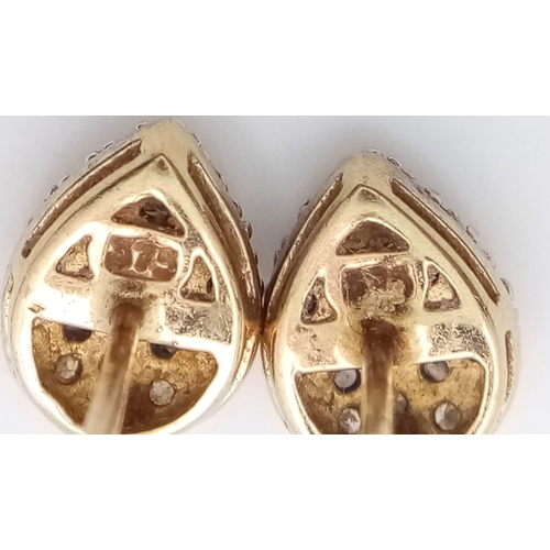 894 - PAIR OF 9K YELLOW GOLD DIAMOND SET PEAR SHAPED STUD EARRINGS, WEIGHT 1G, BOTH NEED BUTTERFLY BACKS