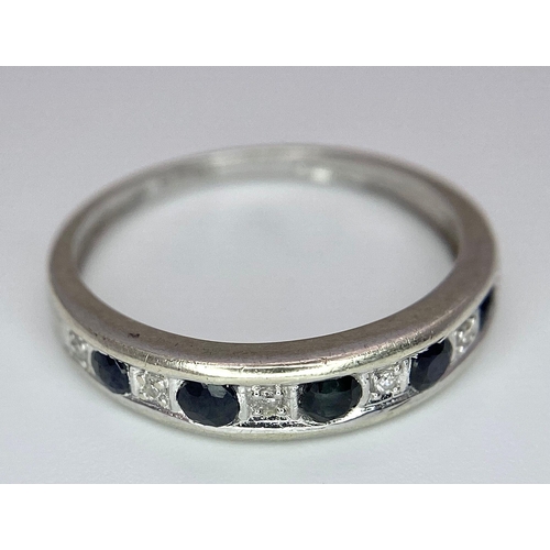 901 - 9K WHITE GOLD DIAMOND & SAPPHIRE HALF ETERNITY BAND RING, WEIGHT 1.2G SIZE K