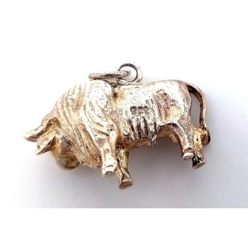 755 - A sterling silver charm in the shape of a bull. Weight: 5.5 g.