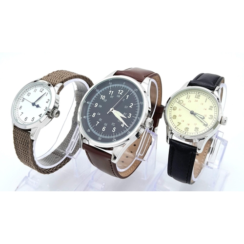 873 - Three Ex Display Military Homage Watches, Comprising; 1)German Waffen-SS Design (50mm), Royal Navy F... 