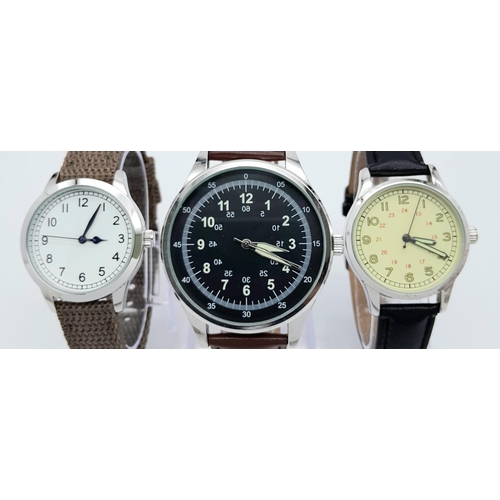 873 - Three Ex Display Military Homage Watches, Comprising; 1)German Waffen-SS Design (50mm), Royal Navy F... 