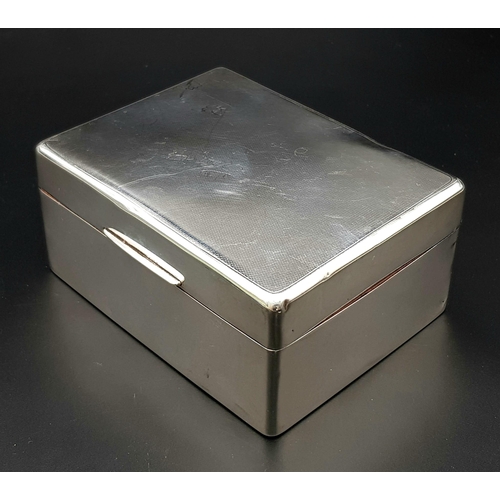 828 - A vintage sterling silver cigarette box with wooden line. Total weight 351.85G. Dimension: L15.5cm X... 