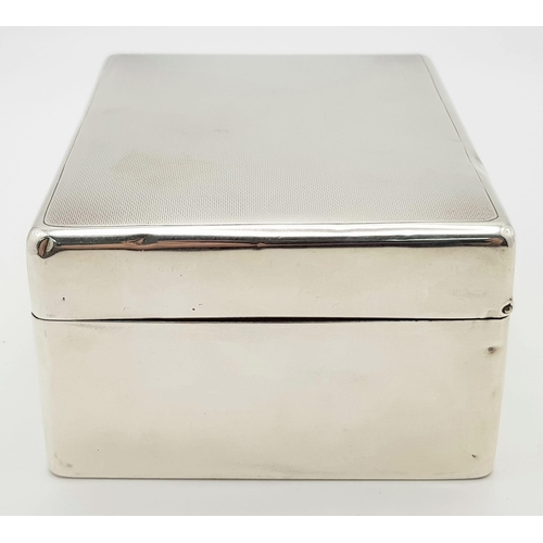 828 - A vintage sterling silver cigarette box with wooden line. Total weight 351.85G. Dimension: L15.5cm X... 