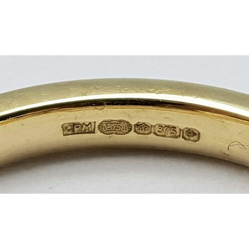 734 - A 9K GOLD BAND RING .    1.7gms    size L