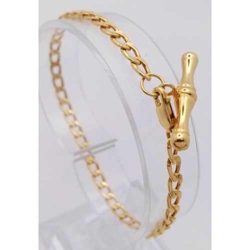 597 - A 9K GOLD T-BAR BRACELET AS NEW ...    2.7gms