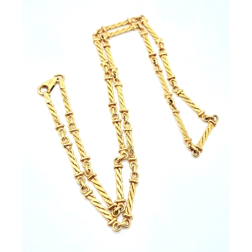 618 - A VERY ATTRACTIVE AND UNUSUAL 9K GOLD PATTERENED BAR LINKED NECK CHAIN .  9.6gms    44cms