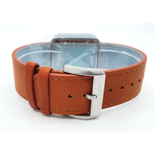 627 - A Verticale Mechanical Top Winder Unisex Watch. Brown leather strap. Silver tone ceramic gilded skel... 