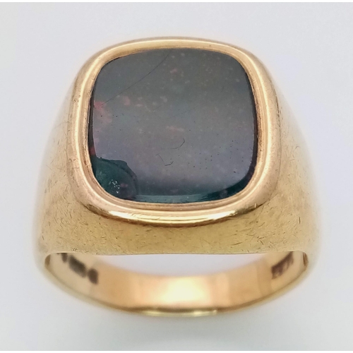 659 - A GENTS 9K GOLD SIGNET RING WITH BLACK OPAL STONE (SMALL CHIP IN STONE) ..10.5gms    size