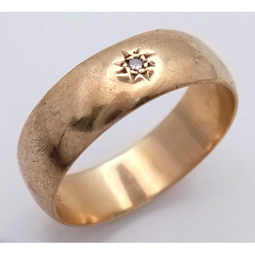 666 - A GENTS 9K GOLD BAND RING WITH SMALL DIAMOND ISET .   6.5gms    size Z