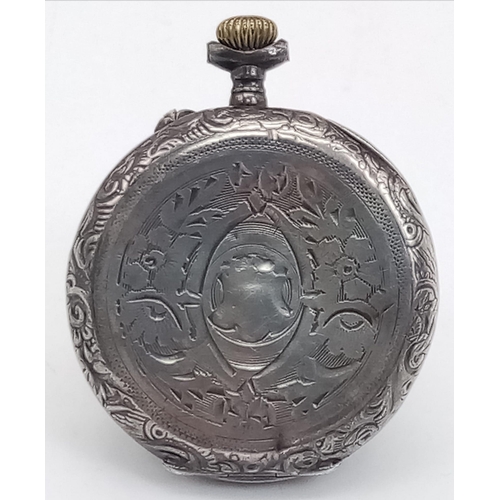 675 - A SILVER MINITURE POCKET WATCH FOR SPARES OR REPAIR.