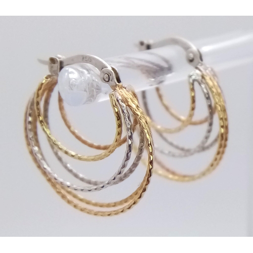 766 - A Pair of 18K White and Yellow Gold Fancy Multi-Hoop Earrings. 3.2g total weight.