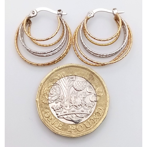 766 - A Pair of 18K White and Yellow Gold Fancy Multi-Hoop Earrings. 3.2g total weight.