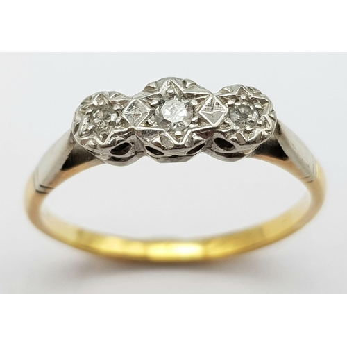 783 - A VINTAGE 18K ROSE GOLD RING WITH A TRILOGY OF SMALL DIAMONDS SET IN PLATINUM TO TOP .     2.4gms   ... 