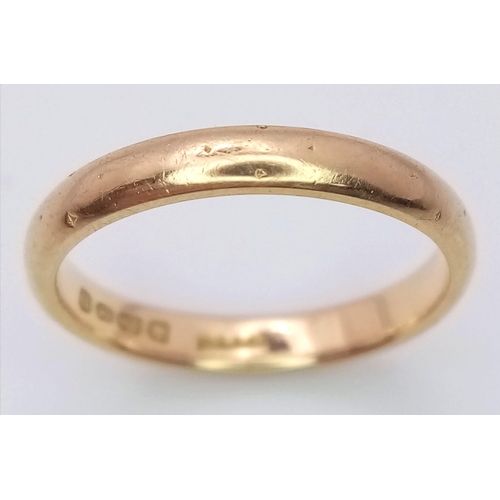 804 - AN 18K GOLD BAND RING .   3.1gms   size L