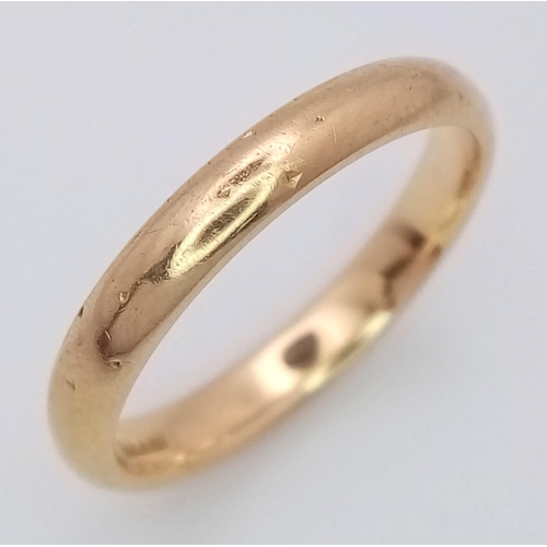 804 - AN 18K GOLD BAND RING .   3.1gms   size L