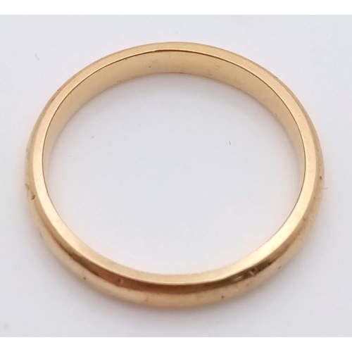 804 - AN 18K GOLD BAND RING .   3.1gms   size L