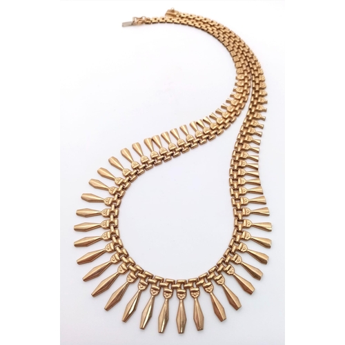 806 - A FABULOUS DESIGNER GRADUATED CHOKER NECKLACE IN 9K GOLD WITH SAFETY CATCH .   18 8gms