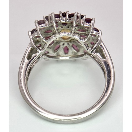 909 - A Very Impressive Opal and Rhodolite Garnet Sterling Silver Ring Size R. The Crown Measures 2.9cm Di... 