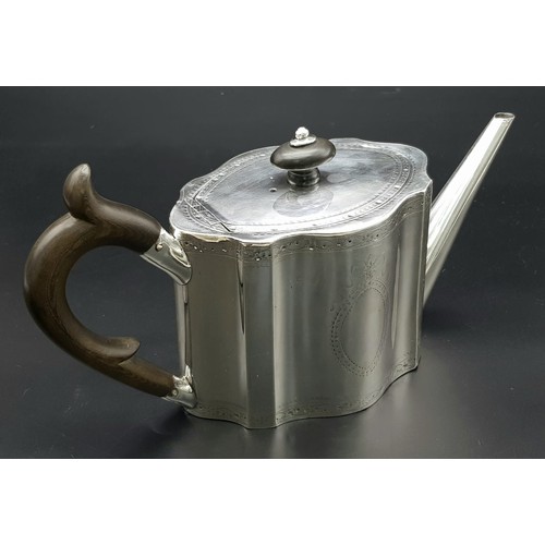 878 - A 1785 Hester Bateman George III Silver Teapot. Oval form with empty cartouche to side. Minimalist g... 