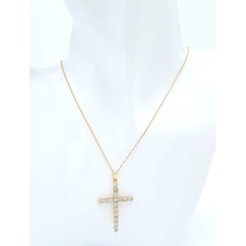 640 - A DIAMOND CROSS PENDANT WITH 15 QUALITY DIAMOND STONES  ON A 46cms 9K GOLD NECK CHAIN .    3.1gms   ... 