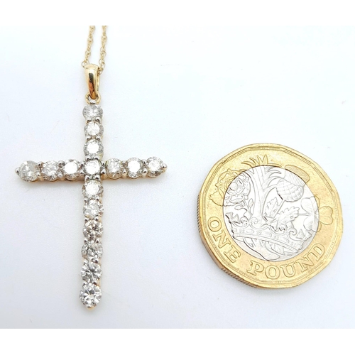 640 - A DIAMOND CROSS PENDANT WITH 15 QUALITY DIAMOND STONES  ON A 46cms 9K GOLD NECK CHAIN .    3.1gms   ... 