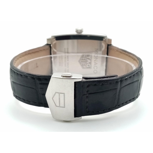 660 - A Tag Heuer Monaco Quartz Gents Watch. Black leather Tag strap. Stainless steel case - 38mm. Black d... 