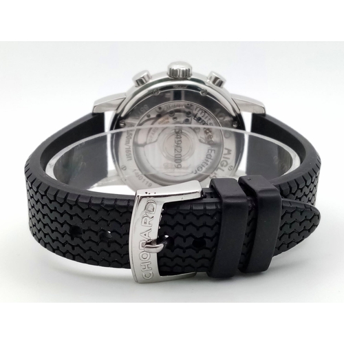 653 - A Chopard Miglia Automatic Chronograph Gents Watch. Black 
vulcanized rubber strap. Stainless steel ... 