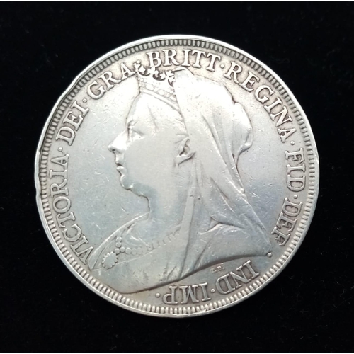 807 - An 1898 Queen Victoria Silver Crown Coin. VF grade but please see photos.