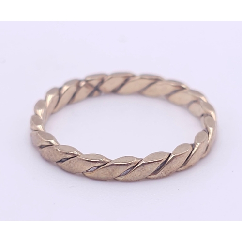 897 - A 9K GOLD LAUREL TWIST BAND RING ..1.4gms   size J