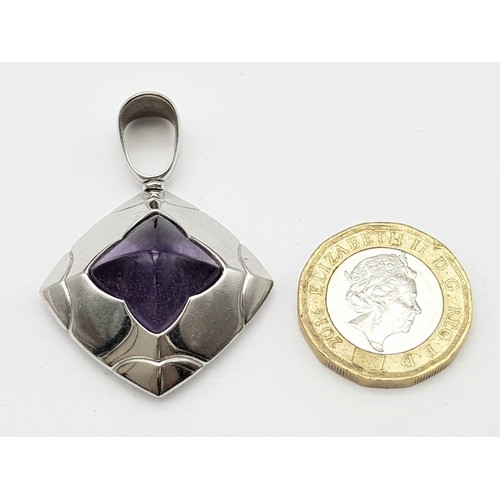 702 - An 18K White Gold Bulgari Pyramid Amethyst Pendant. 5cm.
15.5g total weight. Ref: 016532