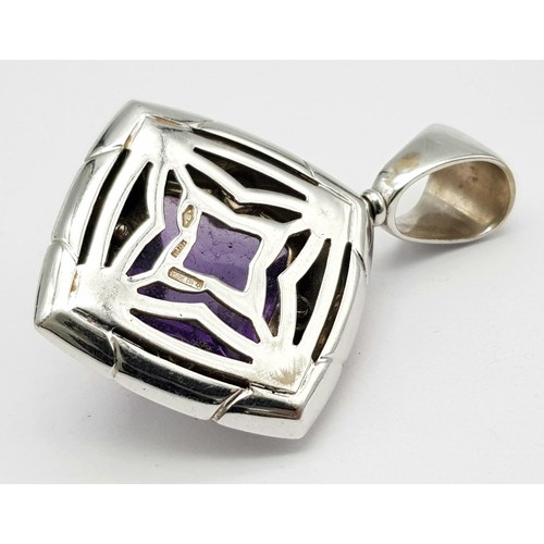 702 - An 18K White Gold Bulgari Pyramid Amethyst Pendant. 5cm.
15.5g total weight. Ref: 016532