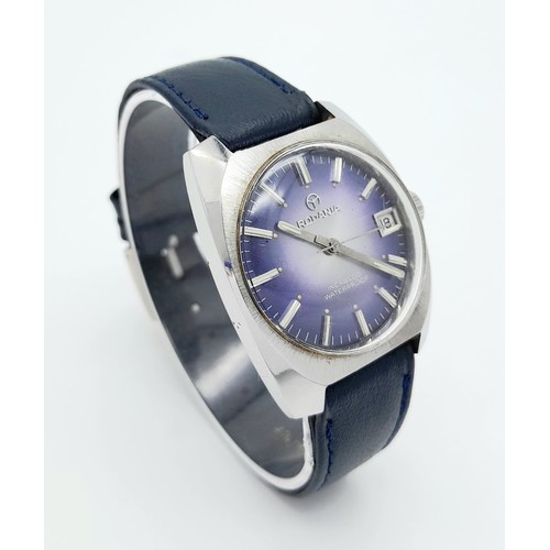 780 - A Vintage Rodania Mechanical Gents Watch. Blue leather strap. Stainless steel case - 32mm. Purple di... 