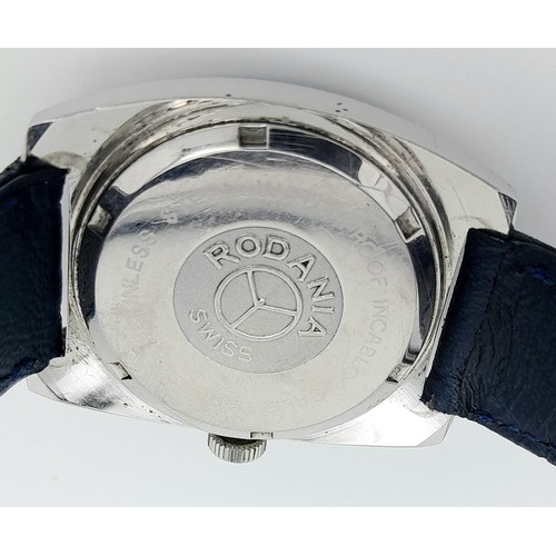 780 - A Vintage Rodania Mechanical Gents Watch. Blue leather strap. Stainless steel case - 32mm. Purple di... 