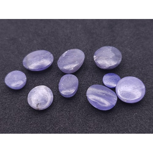 586 - A 19.6ctw Lot of Nine Blue Tanzanite Gemstones. Comes with a clip-open case.