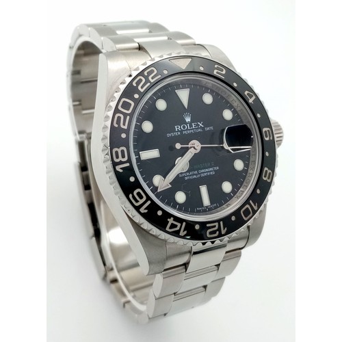 646 - A Rolex GMT-Master II Oyster Perpetual Date Gents Watch. Model - 116710LN. Stainless steel bracelet ... 