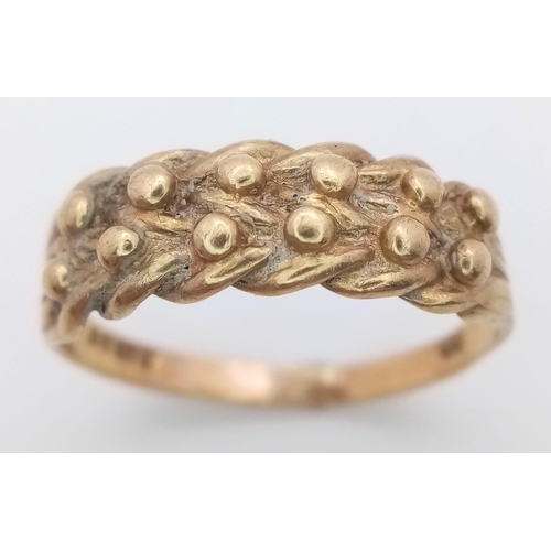 1799 - A Vintage 9K Yellow Gold Keeper Ring. Size U. 2.92g weight.