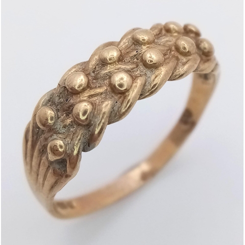 1799 - A Vintage 9K Yellow Gold Keeper Ring. Size U. 2.92g weight.