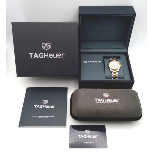 667 - A Tag Heuer Aquaracer Ladies Quartz Watch. Two tone gold plated steel bracelet and case - 32mm. Moth... 