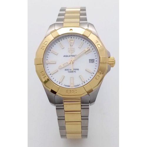 667 - A Tag Heuer Aquaracer Ladies Quartz Watch. Two tone gold plated steel bracelet and case - 32mm. Moth... 