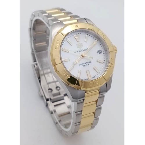 667 - A Tag Heuer Aquaracer Ladies Quartz Watch. Two tone gold plated steel bracelet and case - 32mm. Moth... 