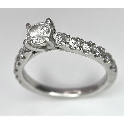 674 - The Best Story - Is The Diamond Story. A 950 platinum diamond ring with a central SI1 0.40ct brillia... 