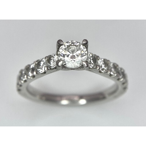 674 - The Best Story - Is The Diamond Story. A 950 platinum diamond ring with a central SI1 0.40ct brillia... 