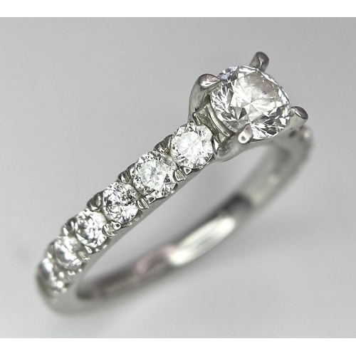 674 - The Best Story - Is The Diamond Story. A 950 platinum diamond ring with a central SI1 0.40ct brillia... 