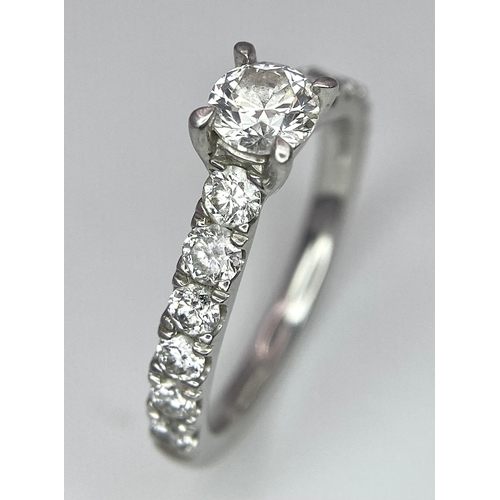 674 - The Best Story - Is The Diamond Story. A 950 platinum diamond ring with a central SI1 0.40ct brillia... 