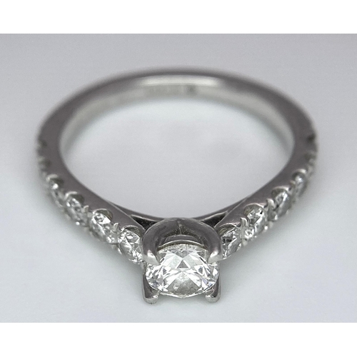 674 - The Best Story - Is The Diamond Story. A 950 platinum diamond ring with a central SI1 0.40ct brillia... 