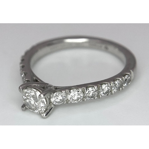 674 - The Best Story - Is The Diamond Story. A 950 platinum diamond ring with a central SI1 0.40ct brillia... 